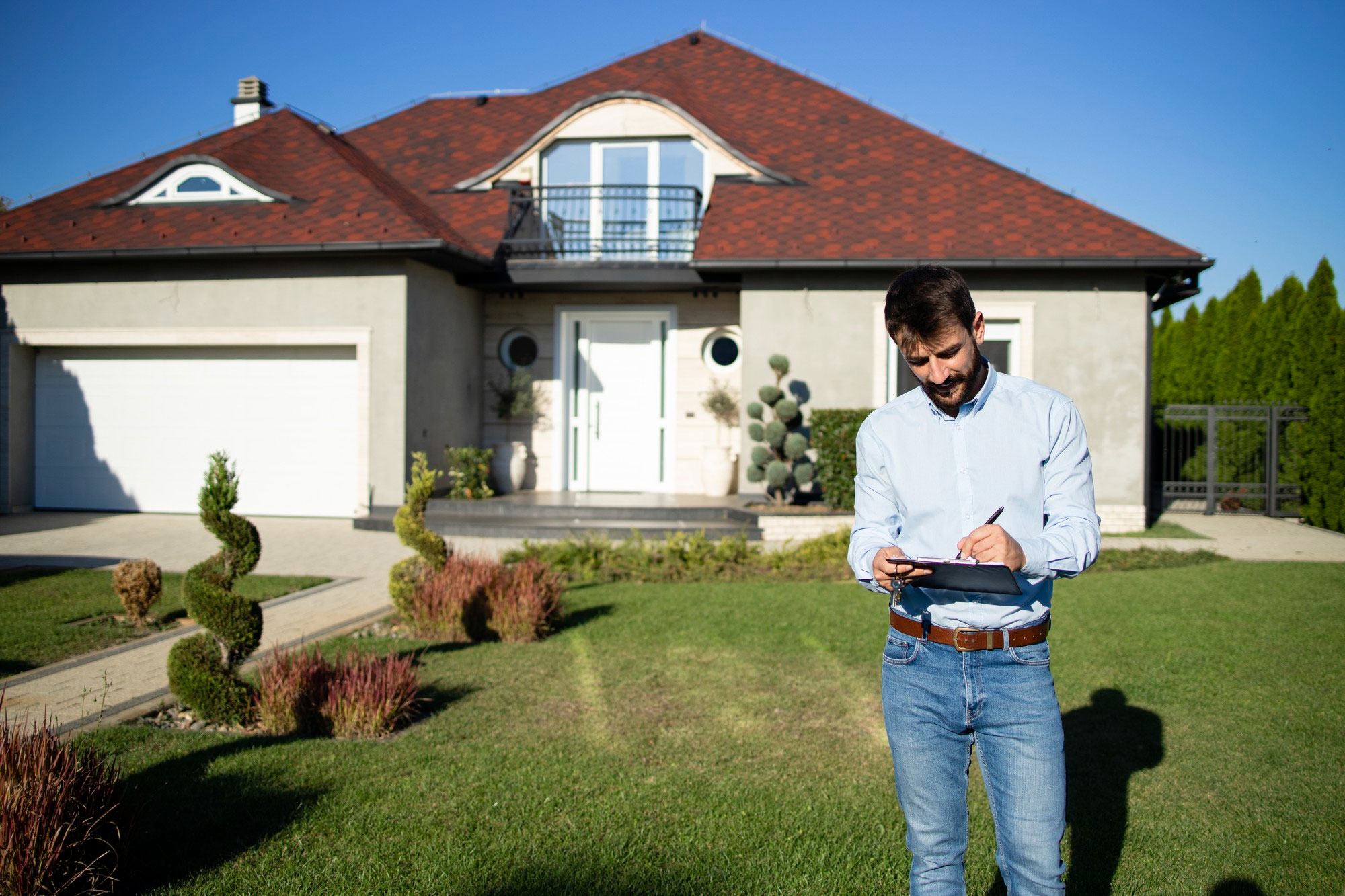 portrait real estate agent checking contract before customers arrive buy house